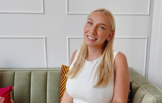 Portrait of Bethany Costen-Davies sitting in meeting area